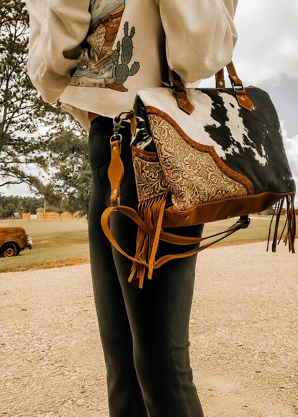 Laramie Tooled Leather Cowhide
Western Statement Bag